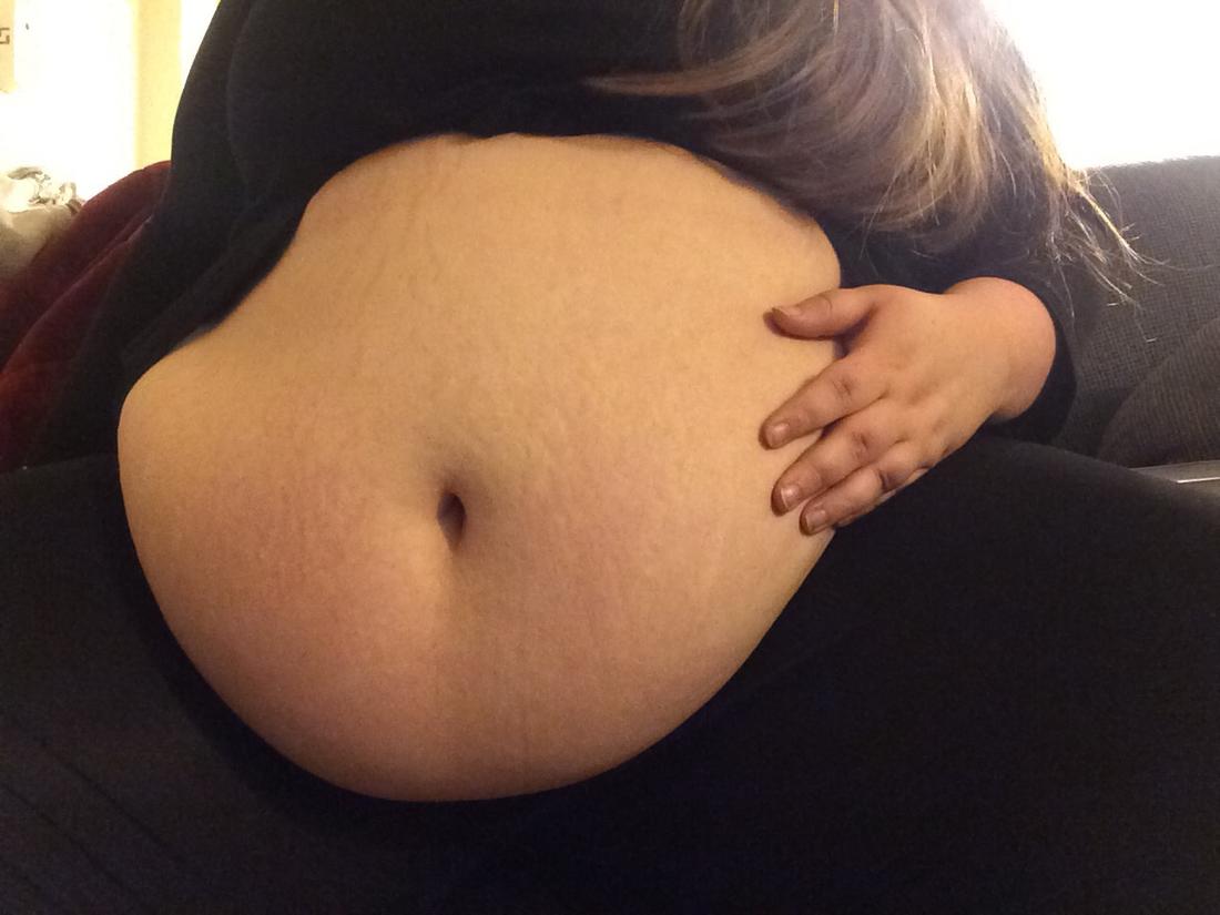 Check out my growing belly and booty lol.