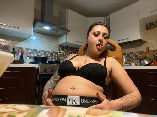 Preggo miniskirt tattoo first time